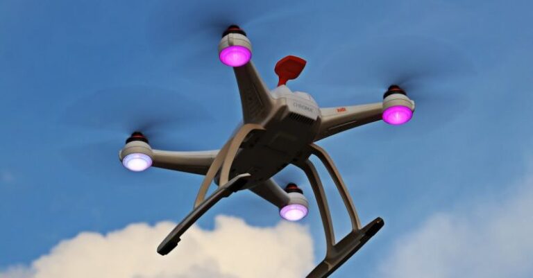Robotics - Turned-on White Quadcopter in the Sky
