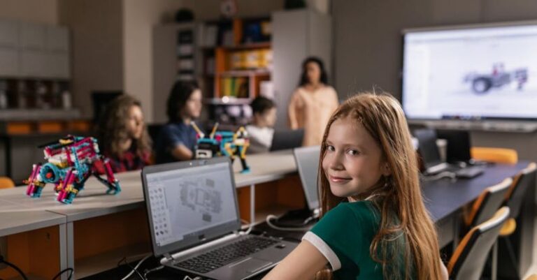 Robotics - A Girl Using a Laptop